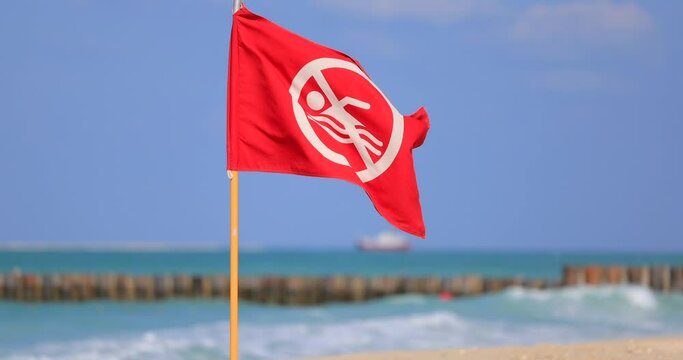 Flag of the storm is waving in the wind