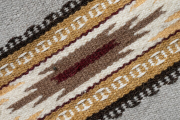 Orange gray woven traditional Ukrainian rug diagonal top view.