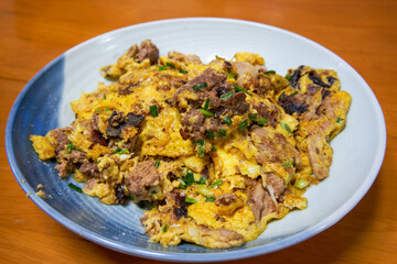 A delicious Chinese dish, scrambled eggs with fish offal