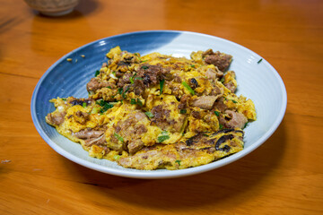 A delicious Chinese dish, scrambled eggs with fish offal
