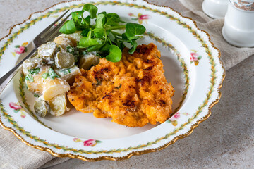 Lemon and thyme pork schnitzel with potato salad