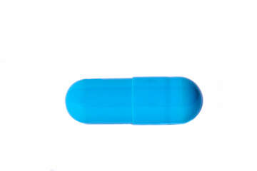 One blue capsule