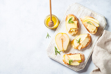 Sweet toast with pear, cheese and honey.