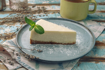 piece of classic cheesecake served on plate