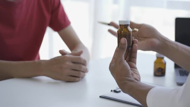 Asian doctors and patients undergo prostate testing. a man consults a doctor Prostate cancer, premature ejaculation, erectile dysfunction Bladder Standard