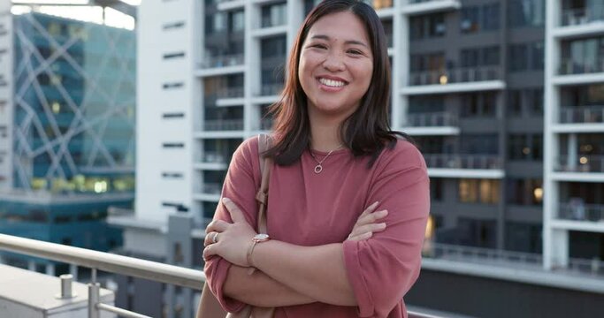 Happy, city and balcony with a business asian woman arms crossed outdoor with a mindset of future growth. Portrait, smile and confidence with a female employee laughing while in an urban town