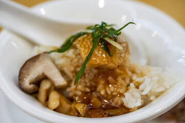 A bowl of delicious steamed fish slices with rice