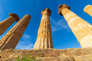 Fototapeta na wymiar Columns of the Temple of Hercules (Tempio di Ercole) in the Valley of the Temples (Valle dei Templi) near Agrigento, Sicily, Italy