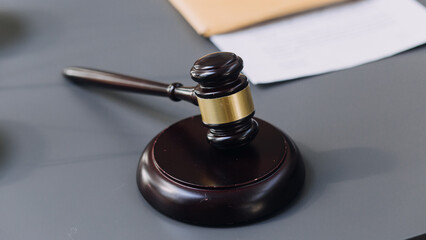 Business and lawyers discussing contract papers with brass scale on desk in office. Law, legal...