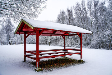 wooden house in the snow