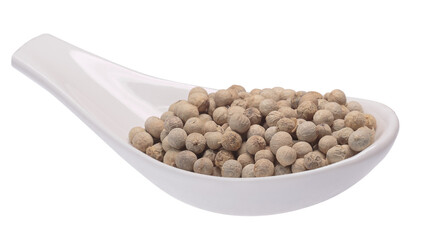 Ceramic spoon of white Sarawak peppercorns (dried seeds of Piper nigrum) isolated png