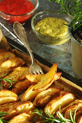 A tray with potatoes backed in oven