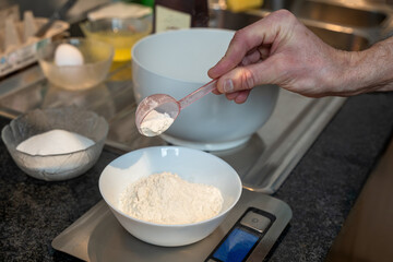 male hands making dough for the cake. Bake a cake at home, handmade, homemade. Recipe, step by step.
