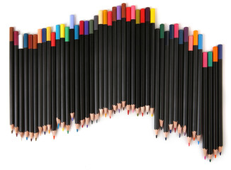 Colored pencils lined up on white background. Color pencils isolated on white. Copy space.