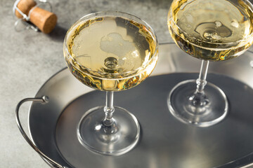 Obraz na płótnie Canvas Boozy Refreshing Champagne in a Coupe Glass