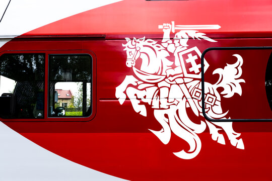 The coat of arms "white Vytis on a red field" of Lithuania found on the side of the Lithuanian National Railway train in TRAKAI, LITHUANIA on SEP 21, 2019