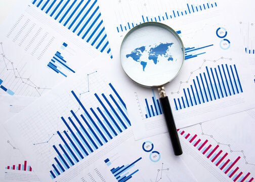 lente di ingrandimento, economia mondiale, pianeta