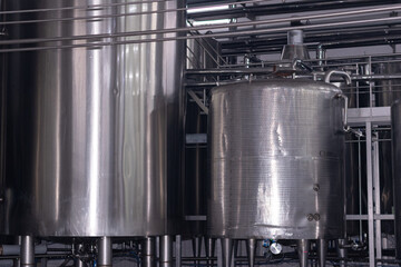 Steel machinery, giant milk storage tank in dairy factory