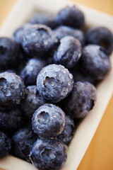 Close-up of fresh blueberries with water droplets
