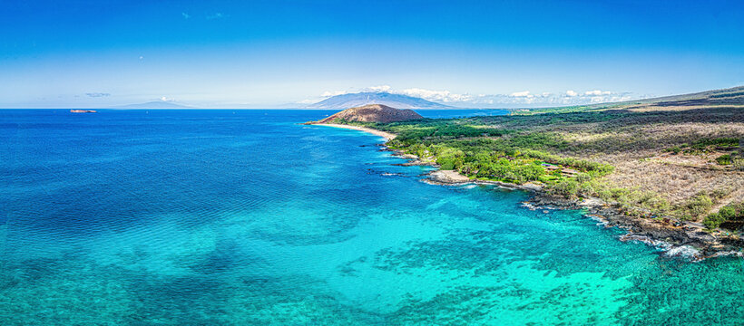 Aerial view of the rugged coastline looking toward Po'olenalena Beach with view of the turquoise water of the Pacific Ocean; Maui, Hawaii, United States of America
