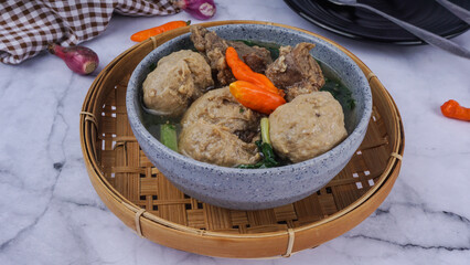 Traditional meatballs from Indonesia, served in bowl. selected focus