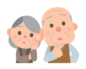 悩んでいる高齢夫婦