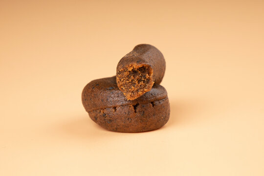 hashish lump of crushed cannabis trichomes, high thc brown charas closeup