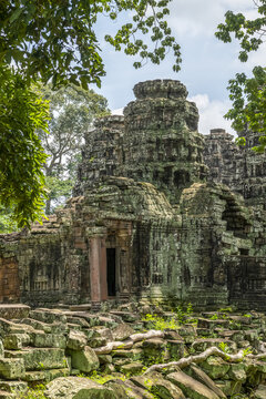 Rear entrance of ruined temple in forest, Banteay Kdei, Angkor Wat; Siem Reap, Siem Reap Province, Cambodia