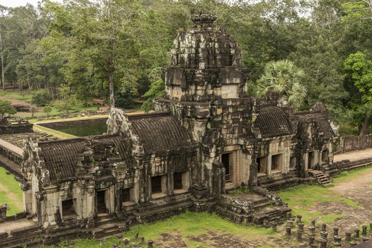 Ruined Baphuon temple in jungle, Angkor Wat; Siem Reap, Siem Reap Province, Cambodia