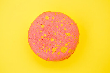 Traditional french cookies macaron on blue background close up. Sweet cookies macaron