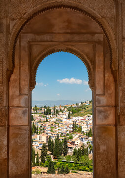 Fototapeta Arched window with a view from Alhambra  Granada, Andalusia, Spain