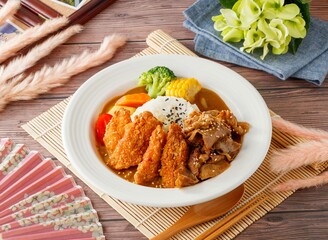 Double Beef and Chicken Curry Rice served in dish isolated on table top view of taiwan food