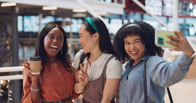Selfie, friends and social media with woman together posing for a photograph in a mall or shopping center. Phone, social media and smile with a happy female friend group taking a picture for fun