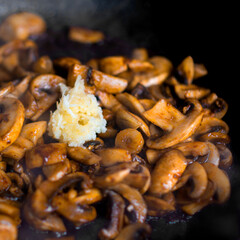 Grilled mushrooms in a pan