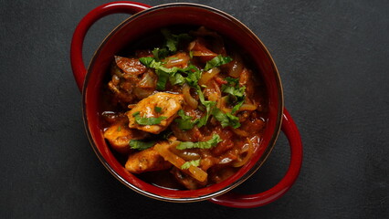 Spanish Chicken stew with tomatoes, onion and spices