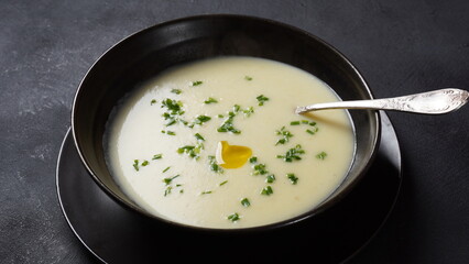 Vichyssoise, classic French chilled cream soup  - potato leek, and  onion topped with chopped chives