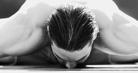 Yoga man stretching body. Artistic black and white clip