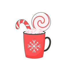 Winter mug of hot chocolate or cocoa with marshmallows and candy cane. Red mug with coffee, christmas candy.