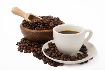 Cup of espresso coffee and coffee beans isolated on white background.