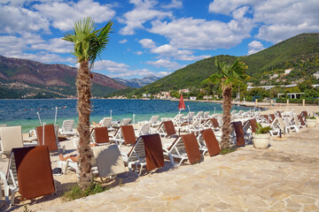 Beautiful autumn Mediterranean landscape on sunny day,  beach vacation.  Montenegro,  Adriatic Sea. Coast of Kotor Bay near Tivat city