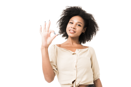 Portrait of a smiling woman with curly hair on a transparent background shows a gesture with her hands