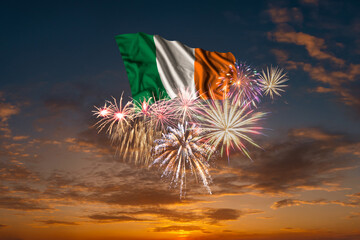 Flag of Ireland and Holiday fireworks in sky