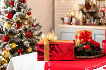 Festive table at home with gifts. Christmas concept, New Year celebration