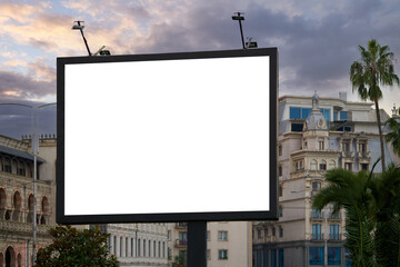 Blank billboard mockup ready for new advertisements. Modern city, blue sky with sunset clouds on...