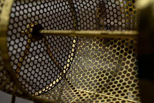 Close Up Of Gold Raffle Drum 