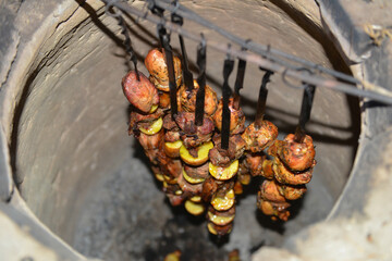 Armenian barbeque in tonir (tandoor) stone oven.