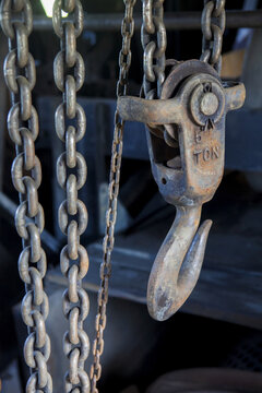 Old relics of gold mining equipment inside the Coal Creek Dredge; Coal Creek, Alaska, United States of America