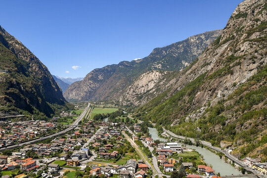 Elevated view of the Arnad valley from  Fort Bard, with the village of Hone and Dora Baltea River in summer, Aosta Valley, Italy