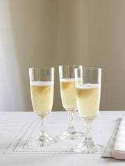 Three glasses of sparkling wine with sorbet.