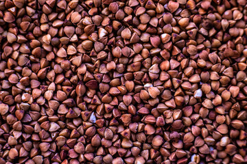 brown buckwheat texture background. Gluten-free diet. Health food natural organic product.